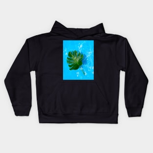 Monstera deliciosa plant floating on blue water Kids Hoodie